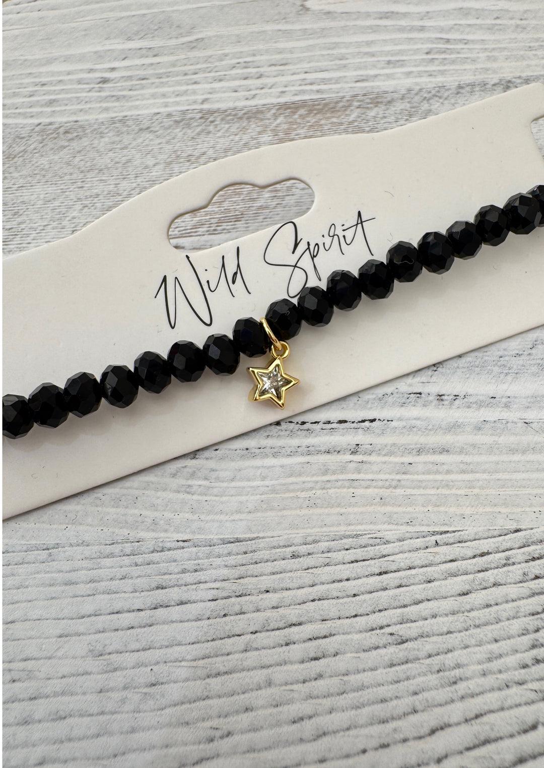 The Black Star Twilight Charm Bracelet