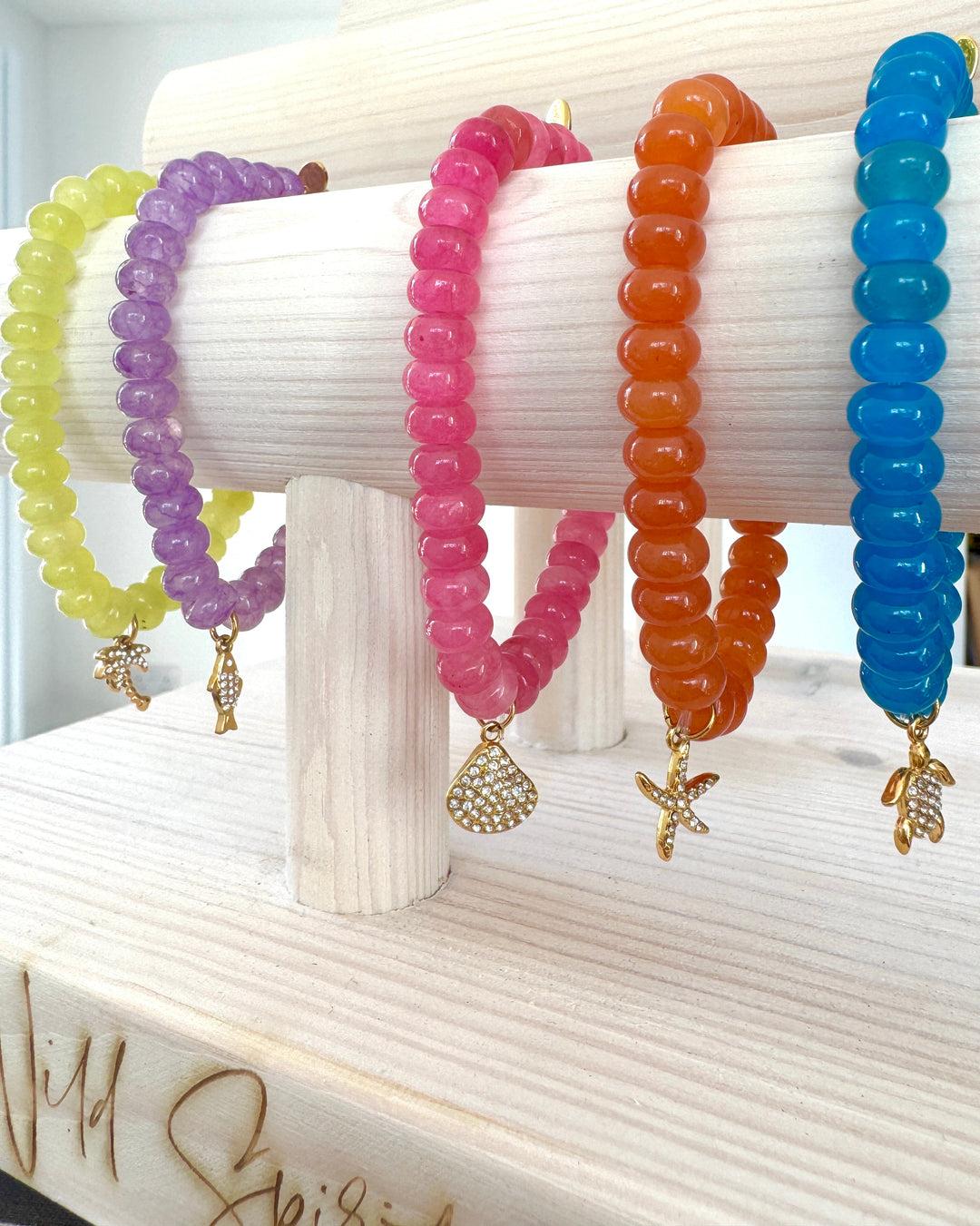 SUN-KISSED CHARM BRACELETS