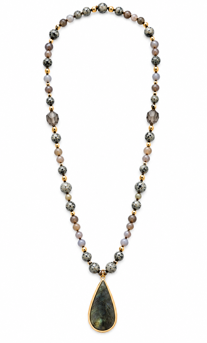 a necklace with beads and a pendant