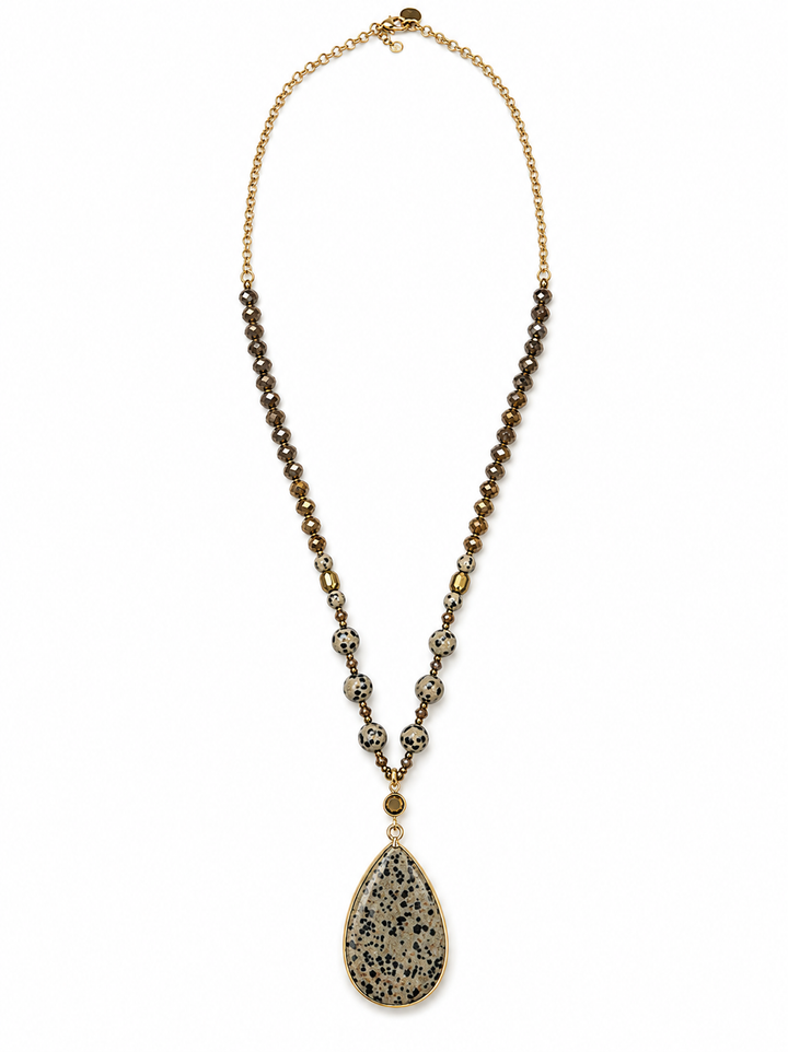a necklace with a stone pendant