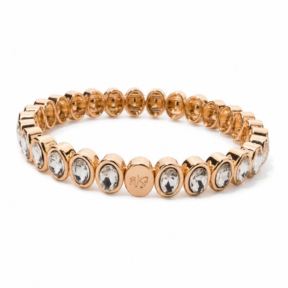 a gold bracelet with diamonds
