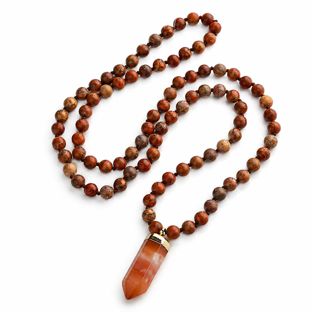 a necklace with a stone pendant