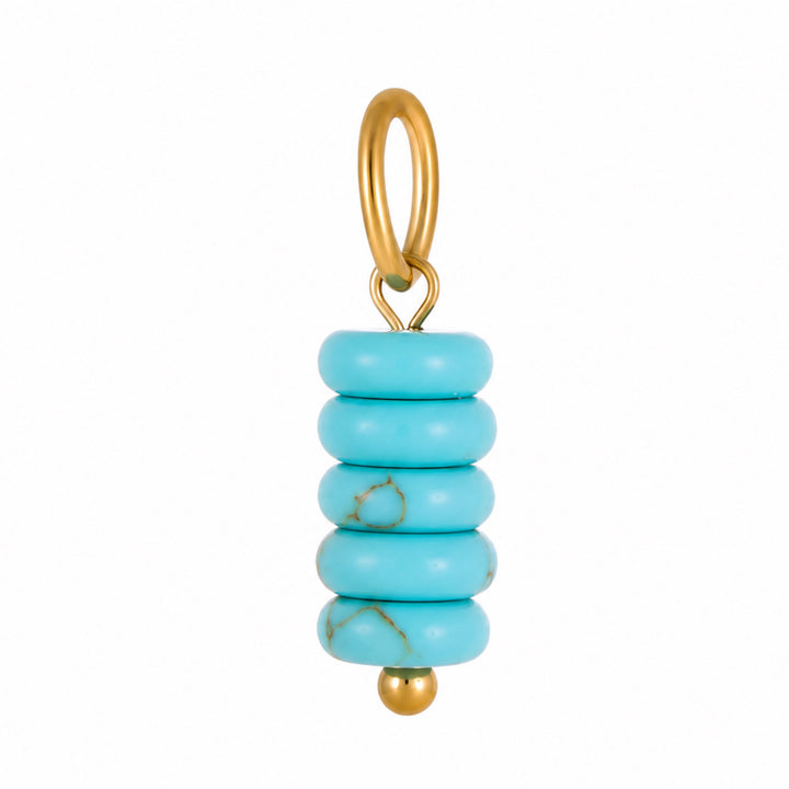 a blue bead with gold ring