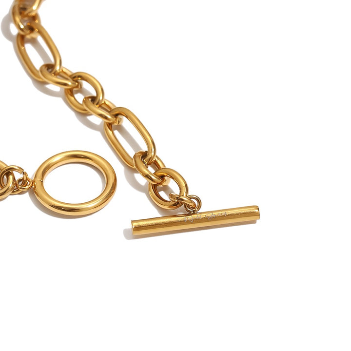 a gold chain with a toggle