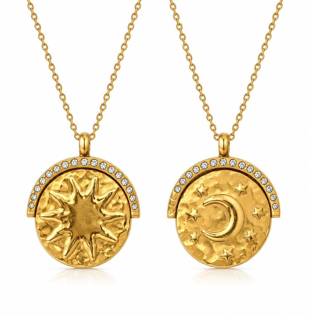 a pair of gold necklaces with a sun and moon and stars