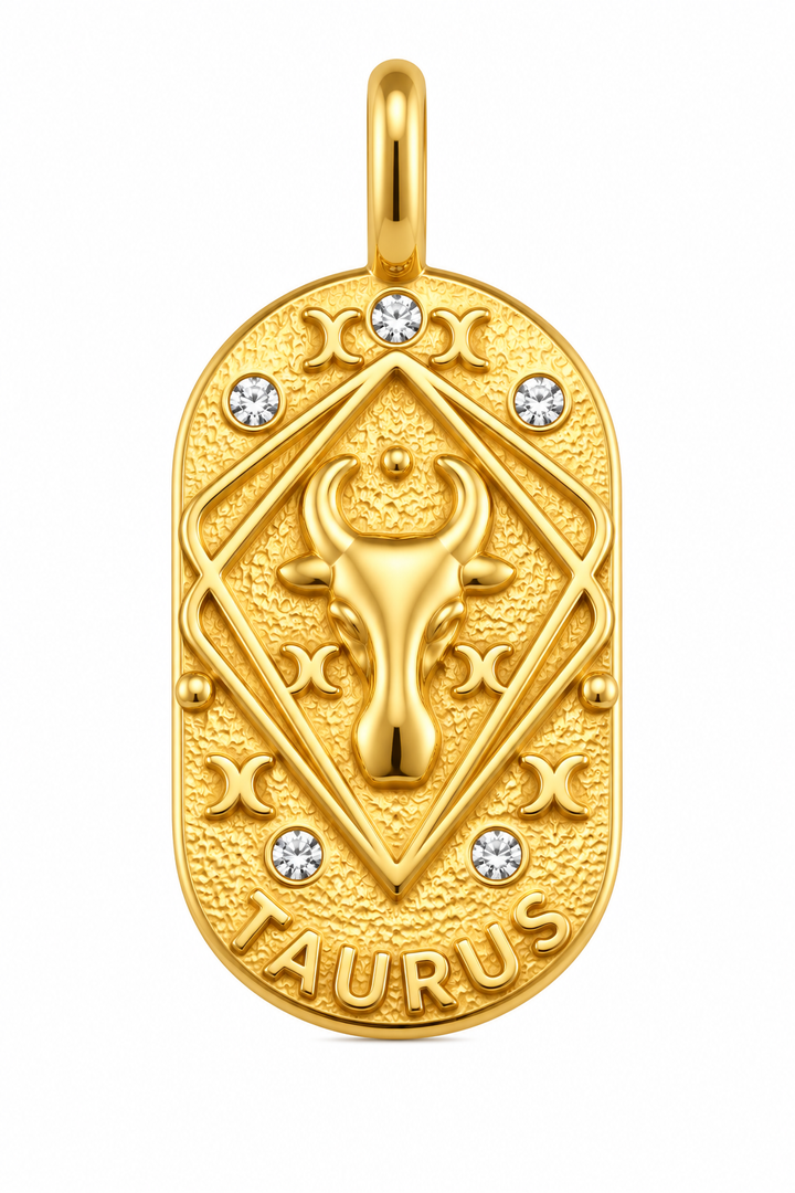 a gold medallion with a bull head and diamonds
