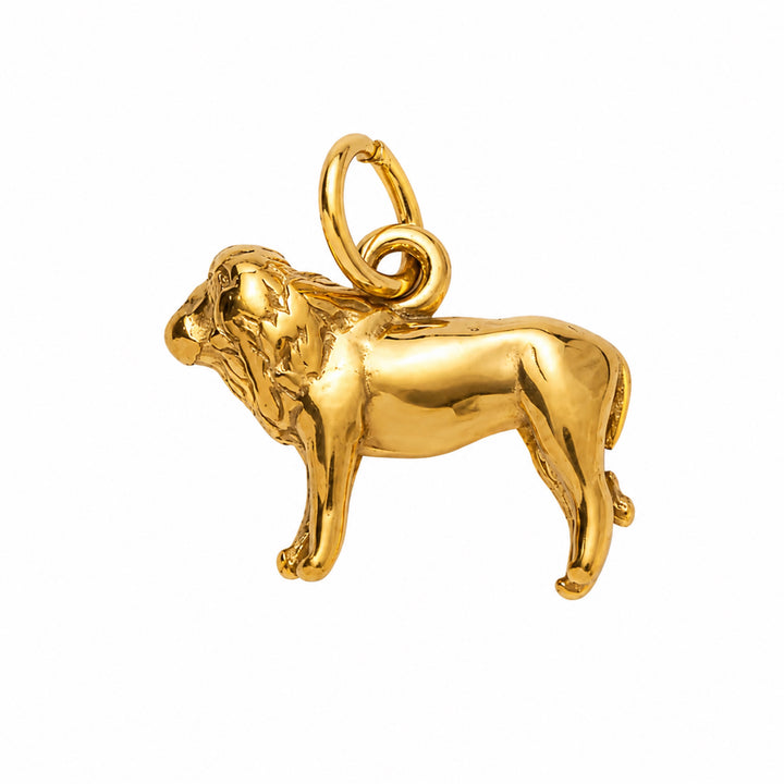 a gold lion pendant on a white background