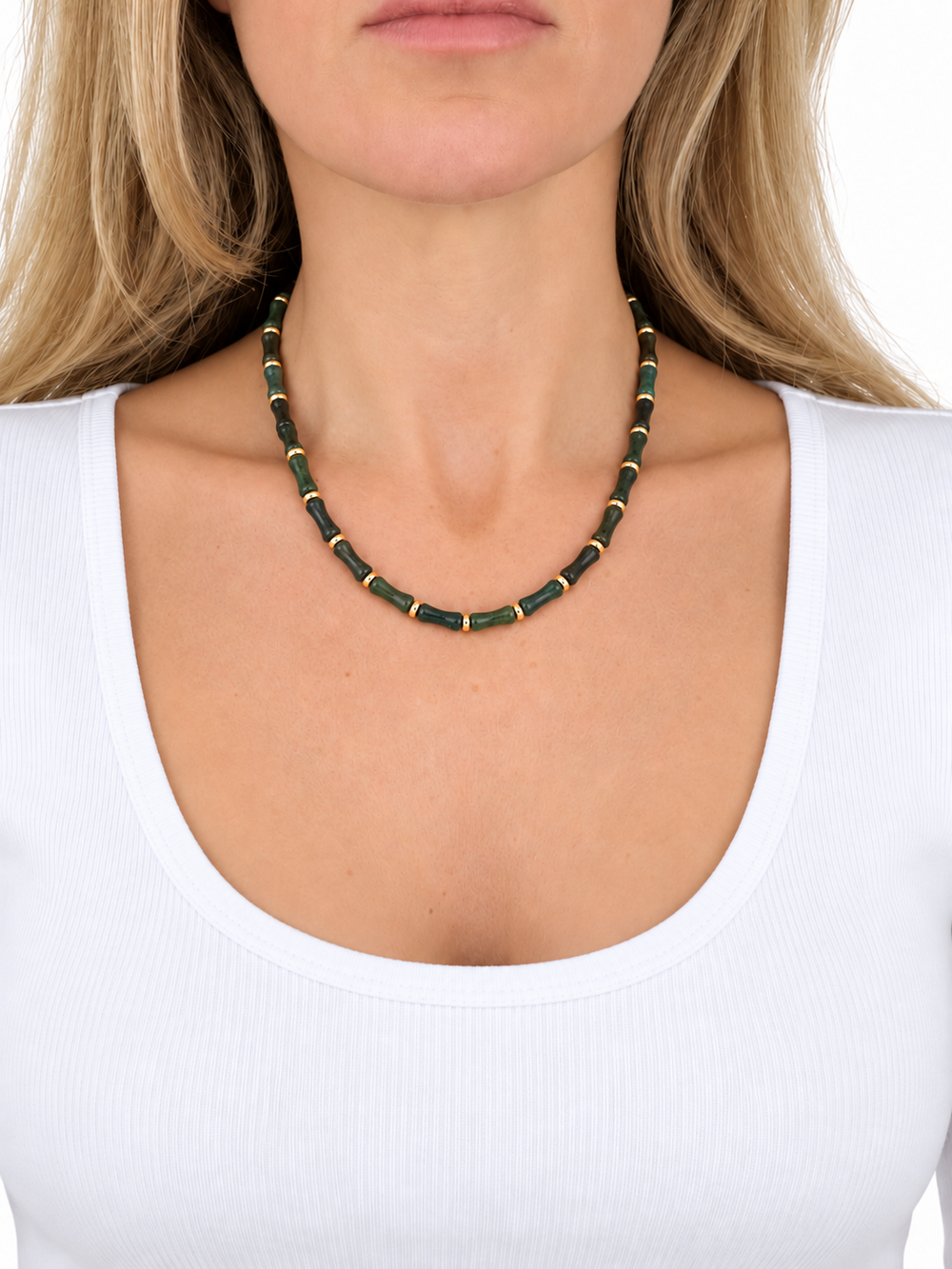 a woman wearing a necklace