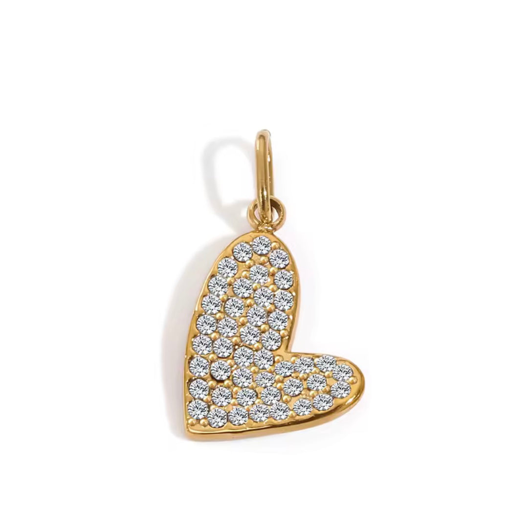 a gold heart with diamonds