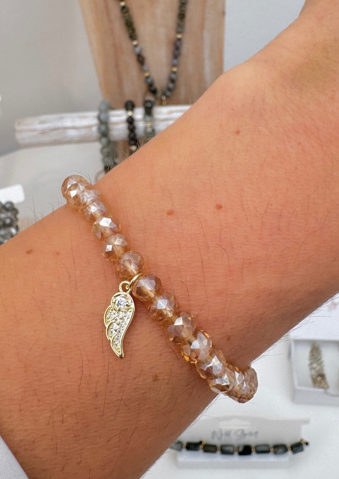 The Gold Wing Twilight Charm Bracelet