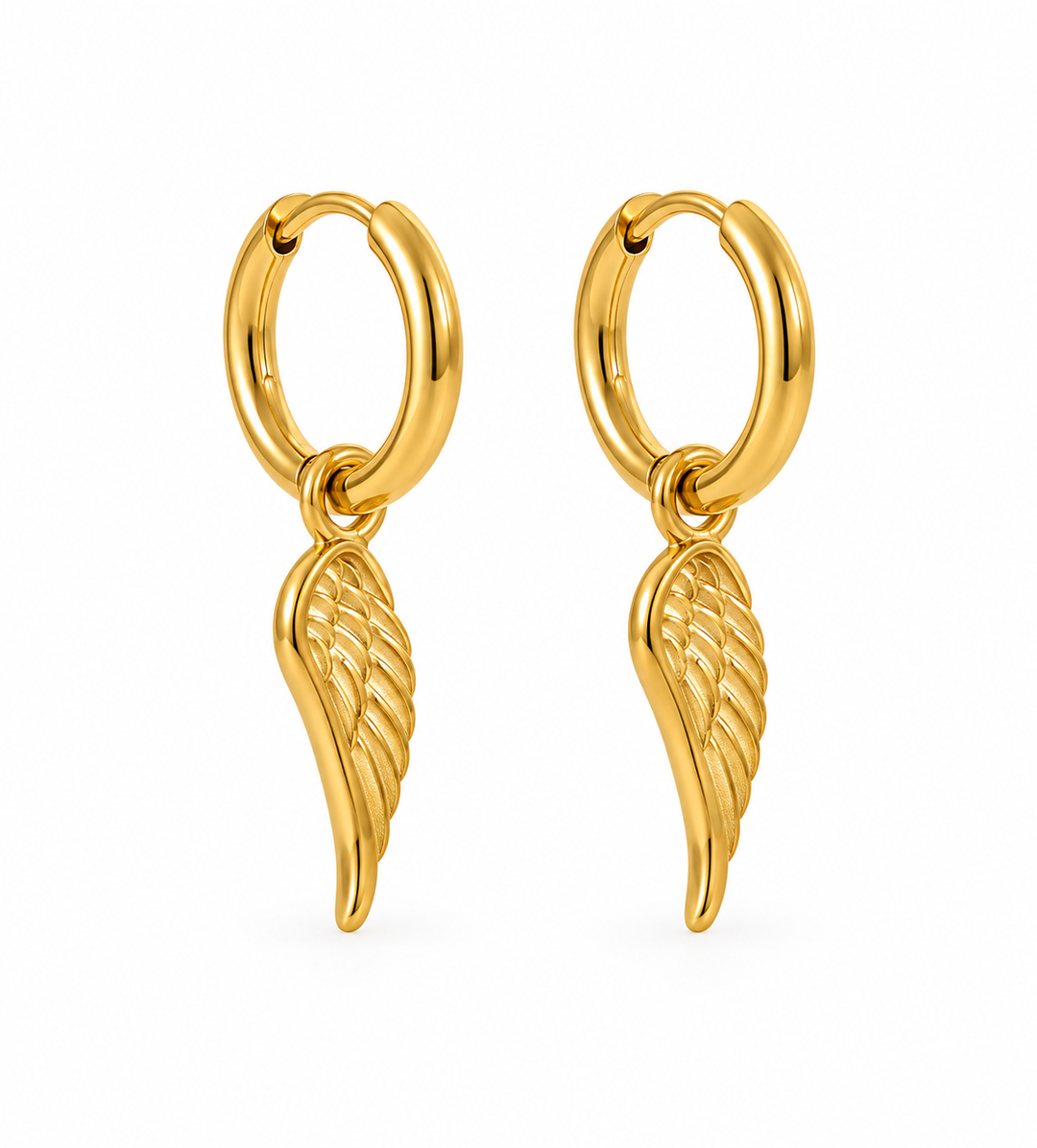 a pair of gold earrings