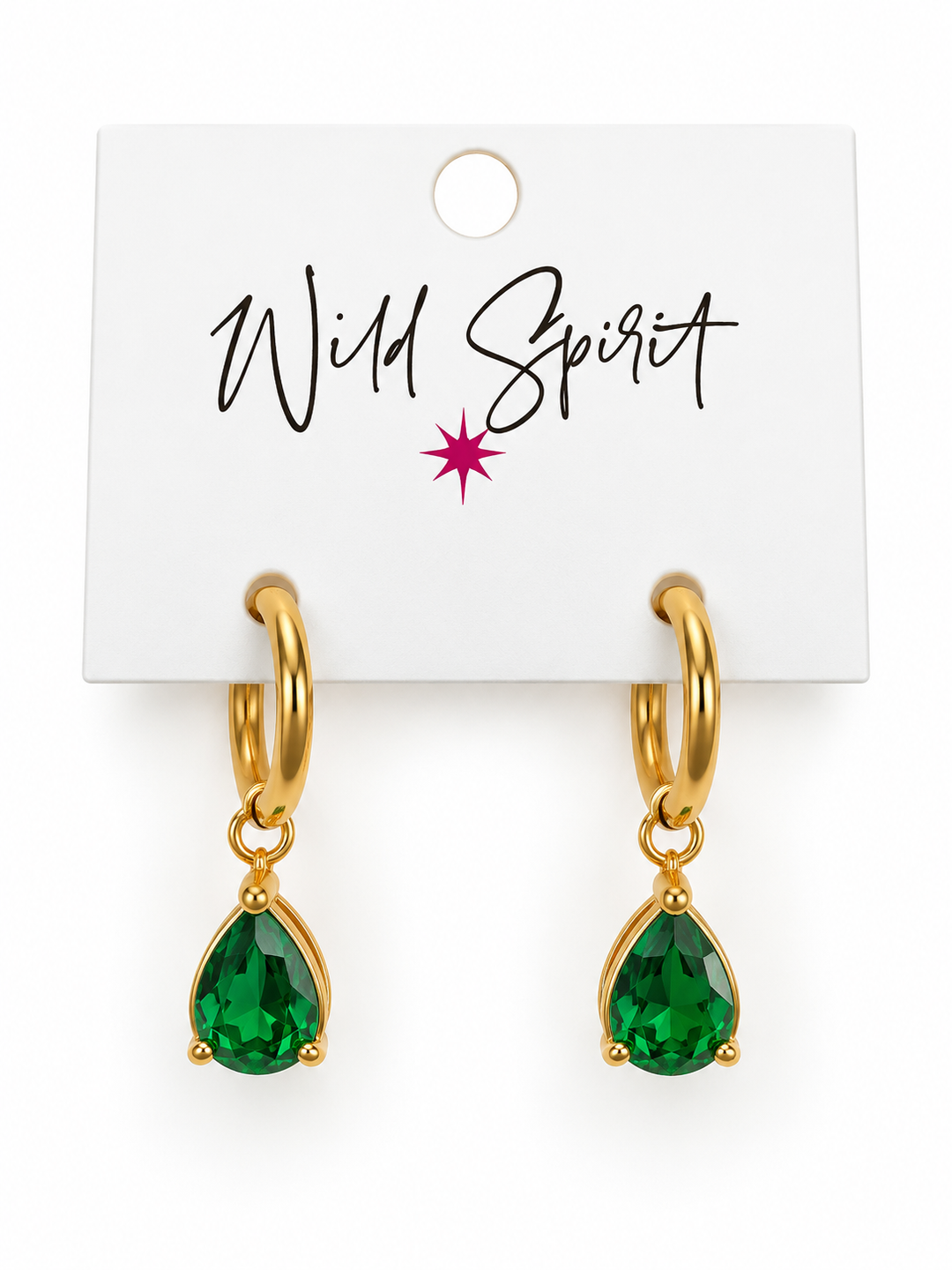a pair of earrings with green gemstones