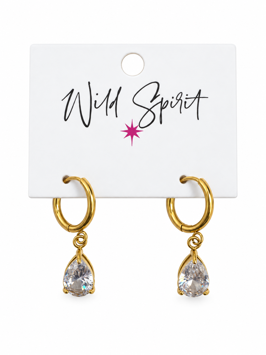 a pair of gold earrings with a white label