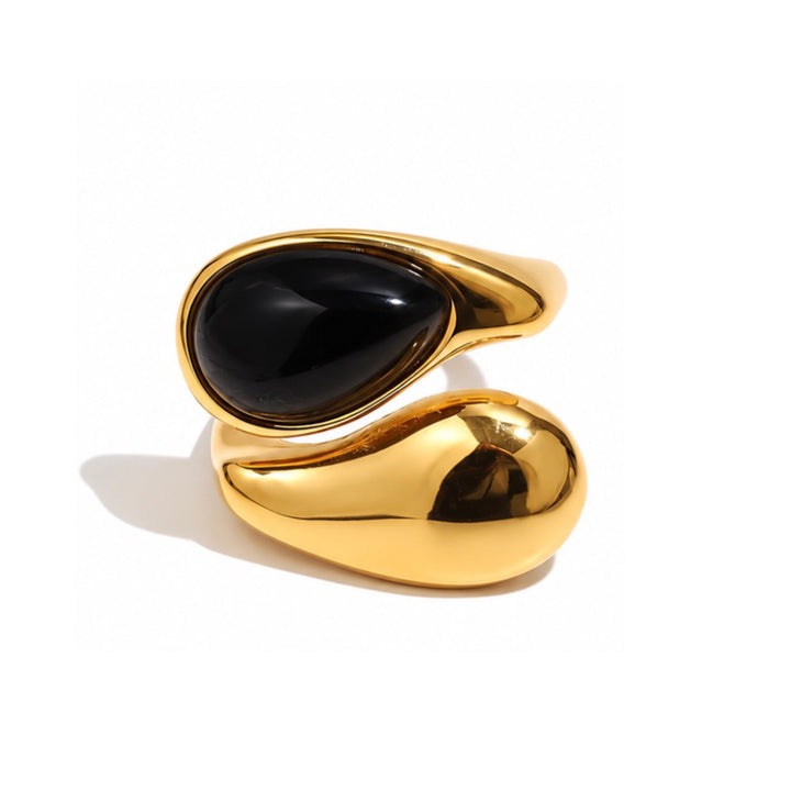 a gold and black ring