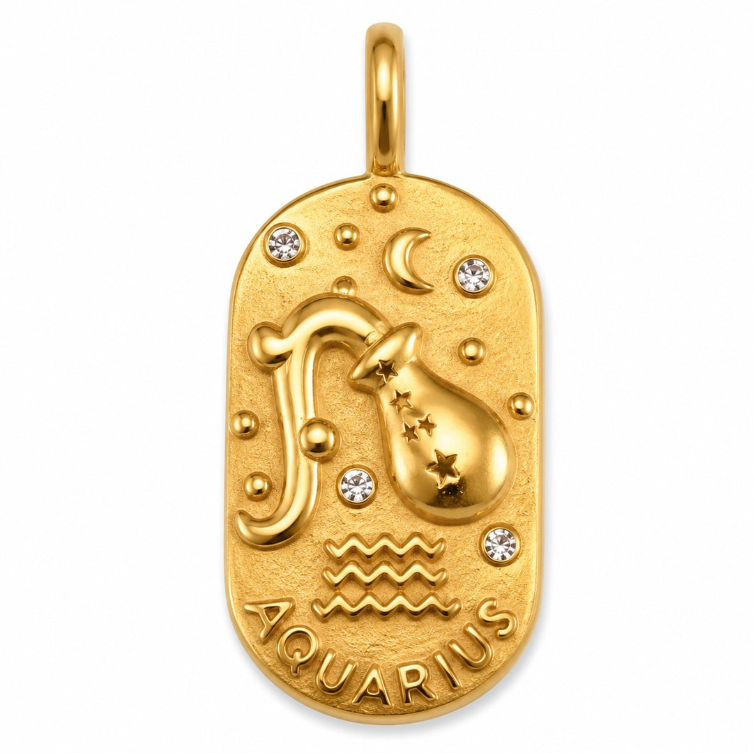a gold pendant with a zodiac sign