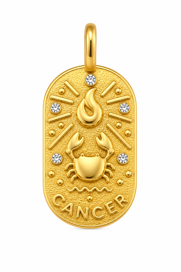a gold pendant with a crab and diamonds