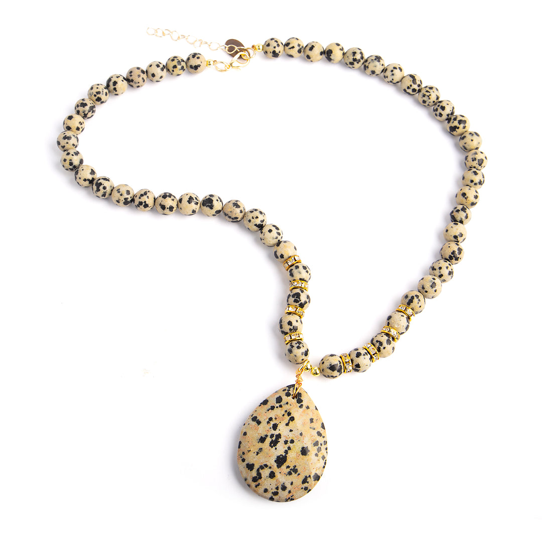 a necklace with a stone pendant