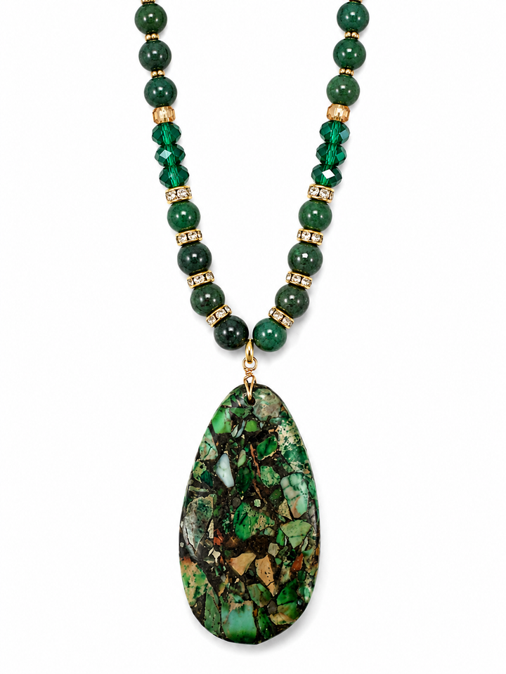 a necklace with a green stone pendant