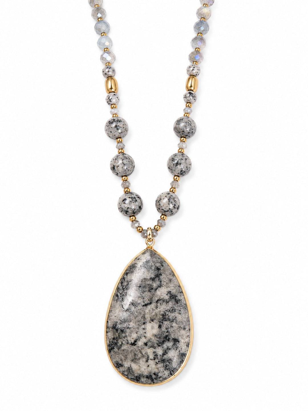 a necklace with a stone pendant