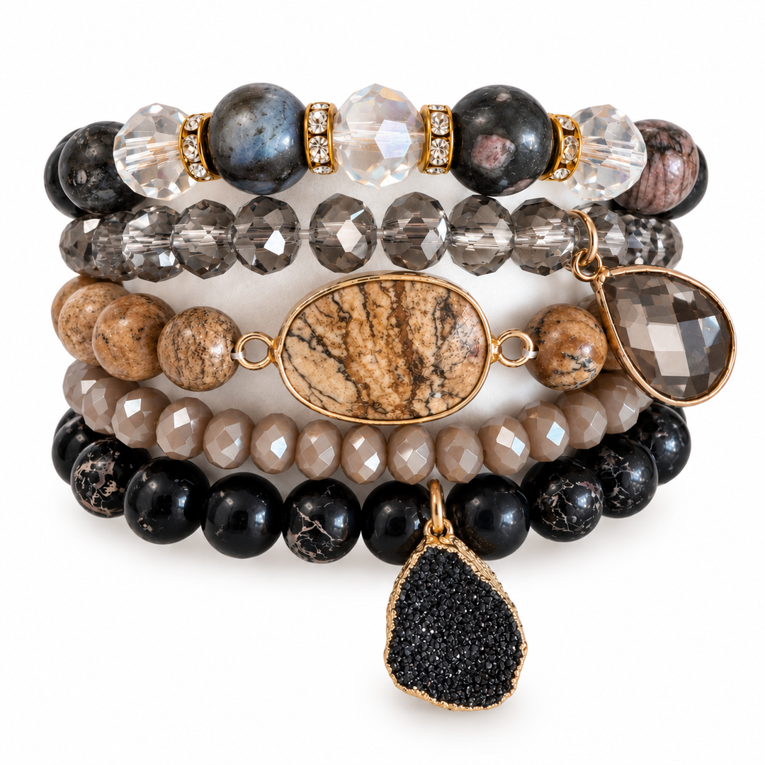 a stack of bracelets with different stones