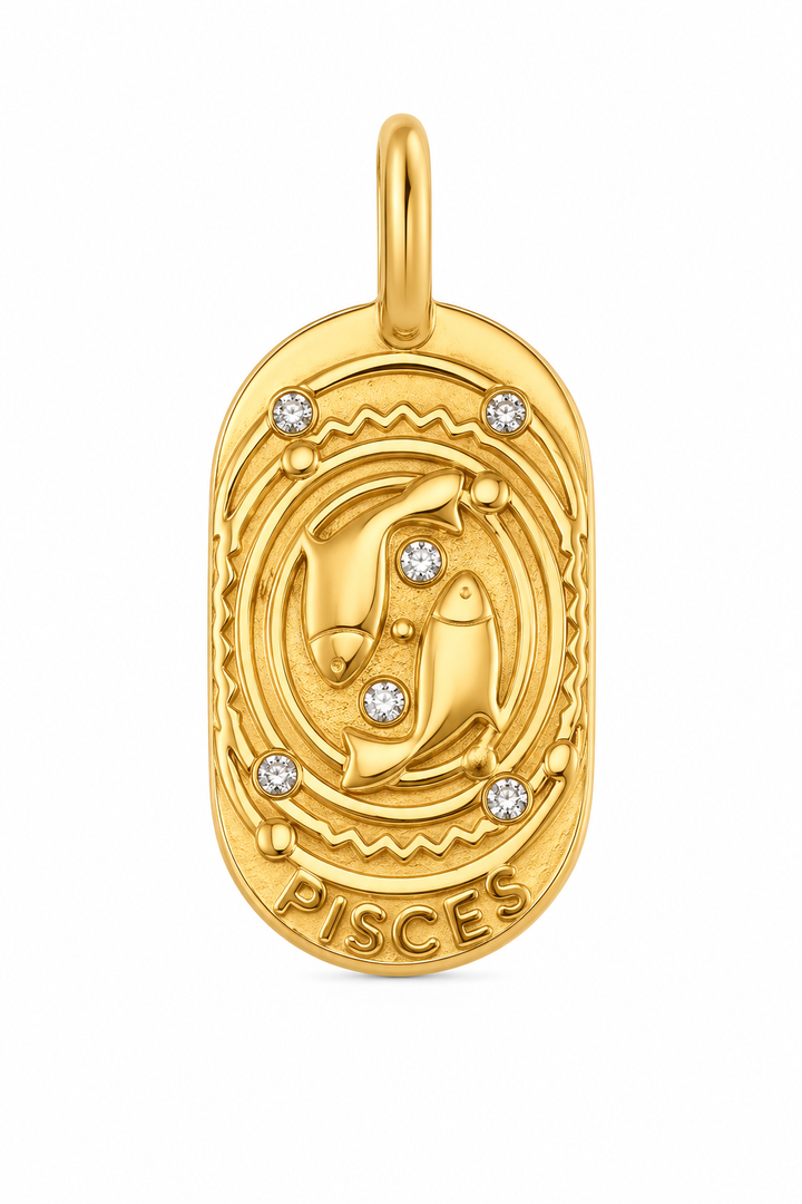 a gold pendant with a zodiac sign