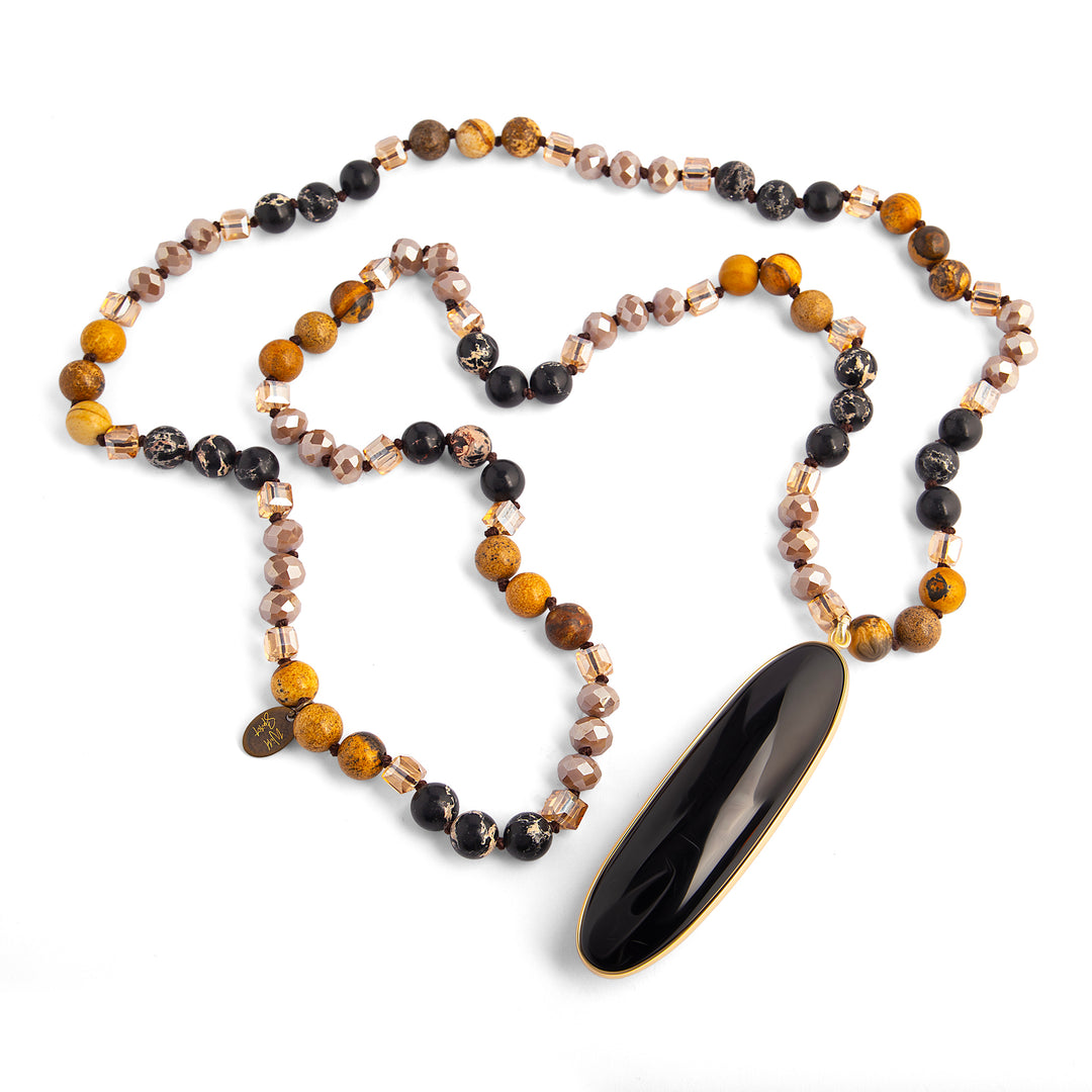 a beaded necklace with a pendant