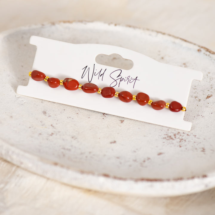a bracelet on a plate
